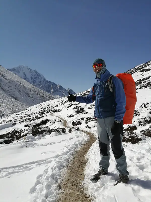 Man enjoying view of the mountains on the way to everest base camp