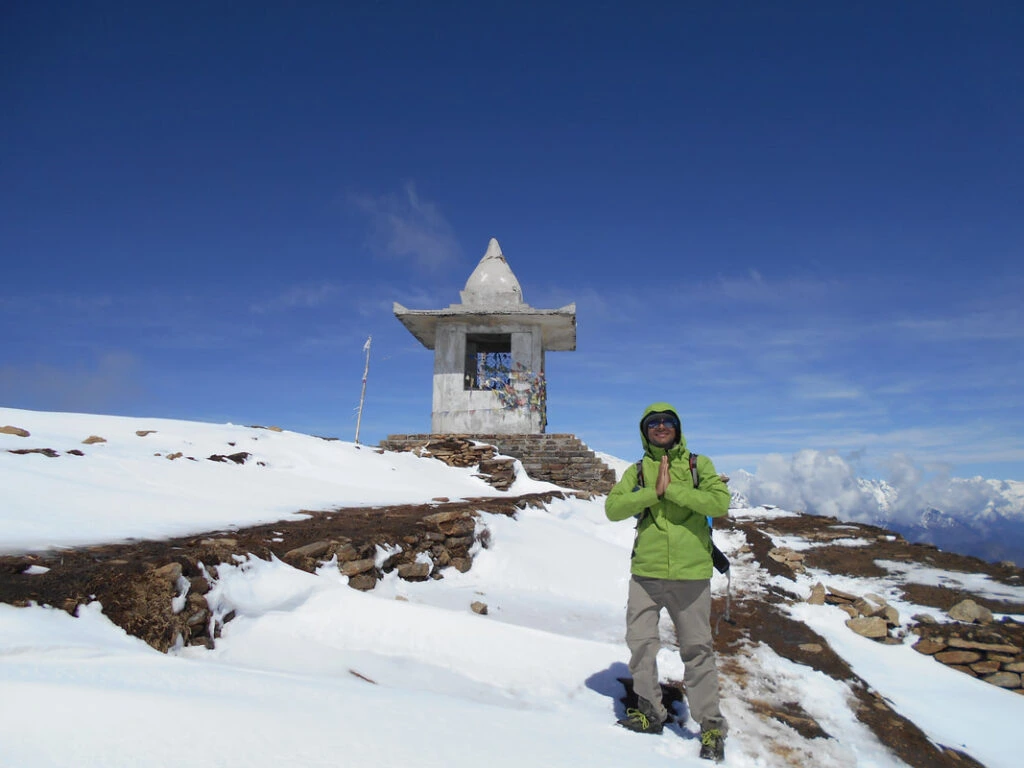 man welcoming guest to nepal form gosaikunda lake trek